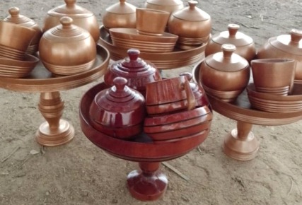 A group of glazed pottery items from the brochure product display.