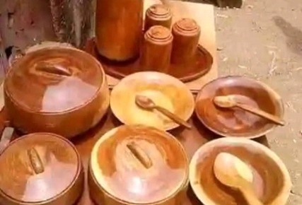 Wooden bowls and crafted items displayed in the nature-based products section.